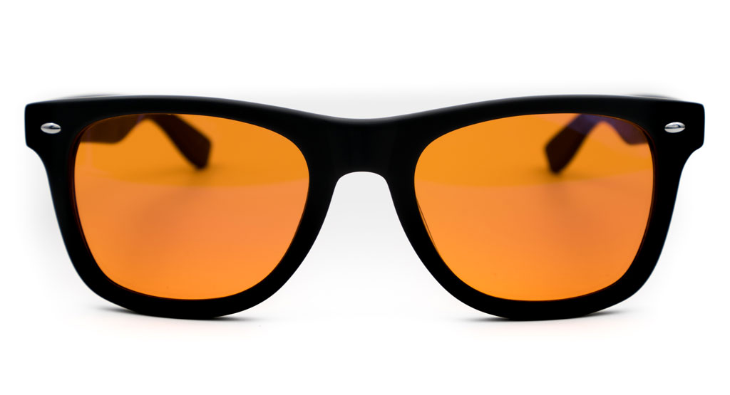 H.E.A.L blue light blocking glasses — matte black wayfarer frame with amber lenses